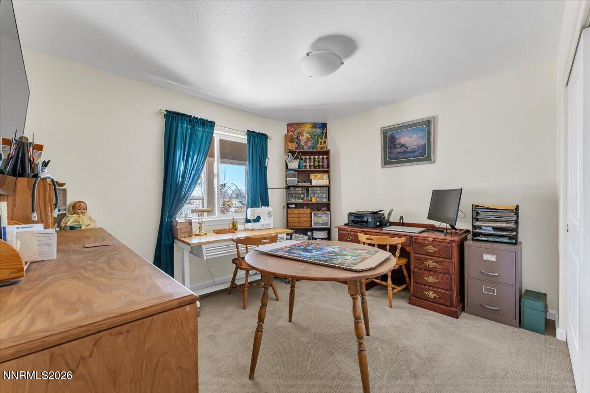 1197 Sky Ridge Drive Fallon, NV 89406 - Photo 26 of 79 a view of a workspace with furniture