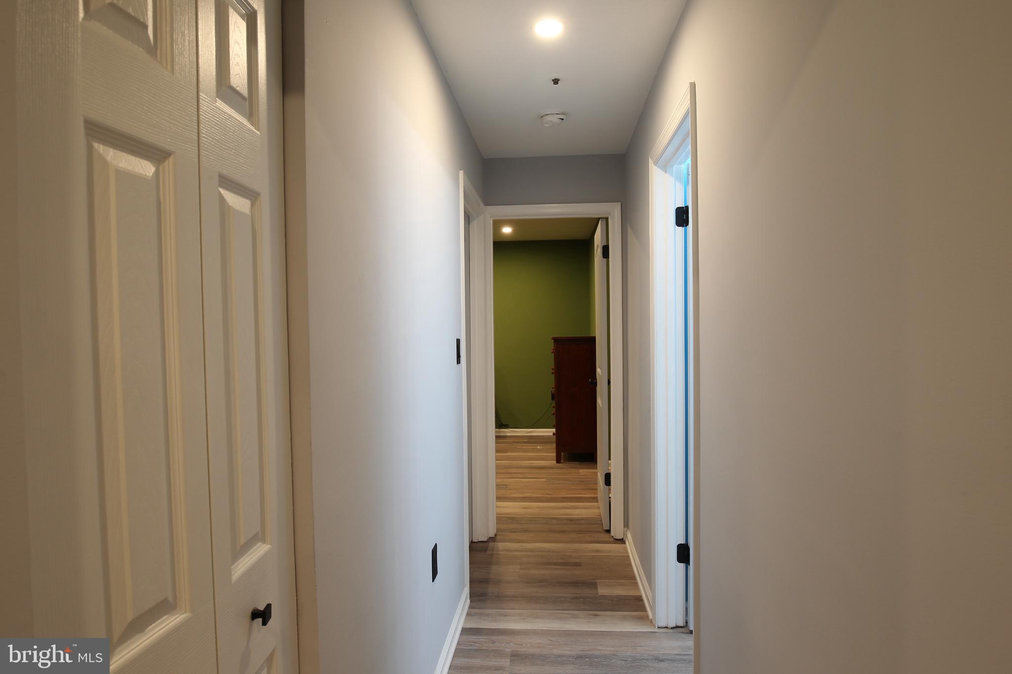 8391 Montgomery Run Road, Unit C Ellicott City, MD 21043 - Photo 8 of 15 Hallway to Bedrooms