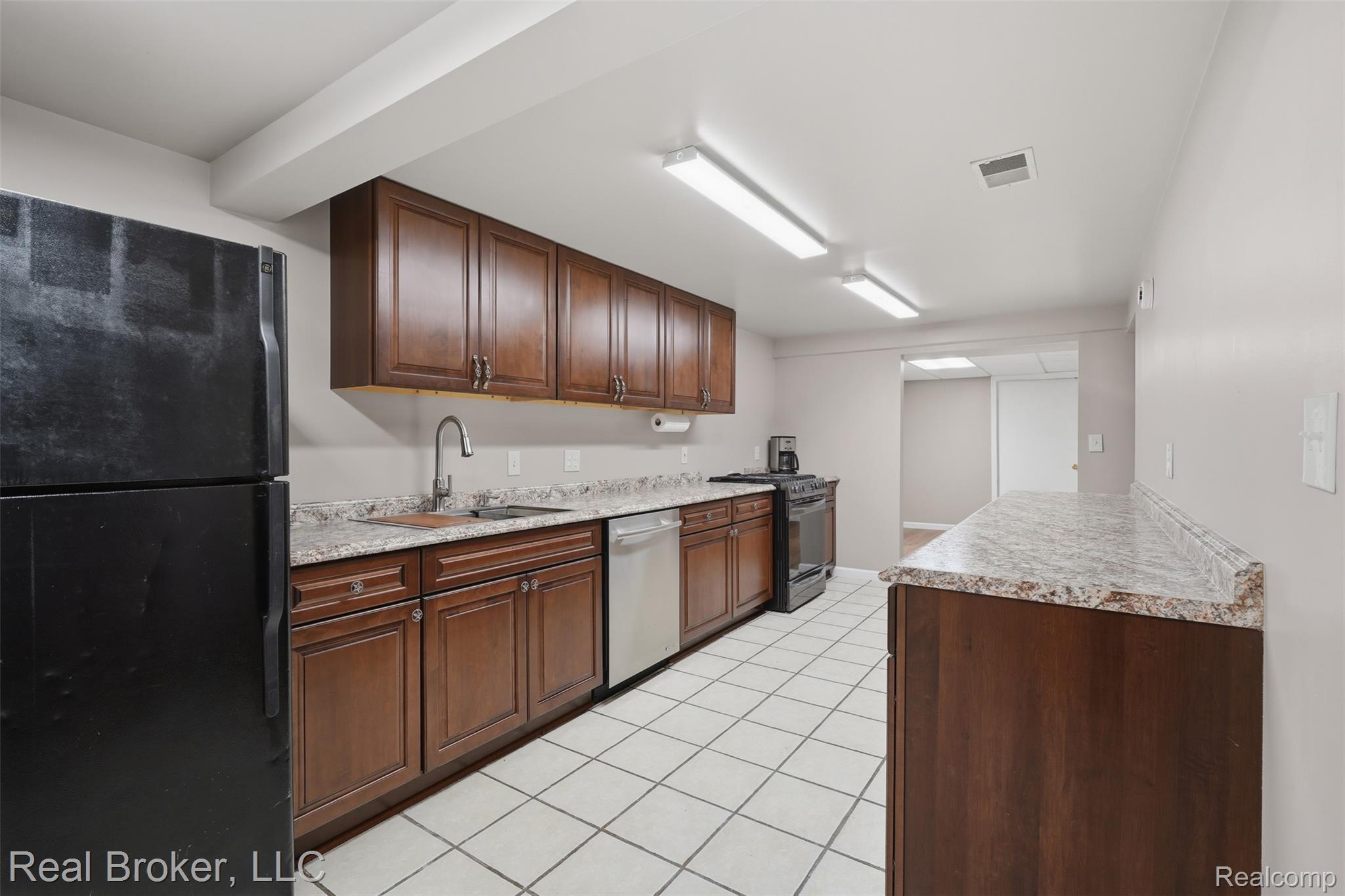 3167 Roods Lake Road Lapeer, MI 48446 - Photo 17 of 38 2nd full kitchen in finished basement.