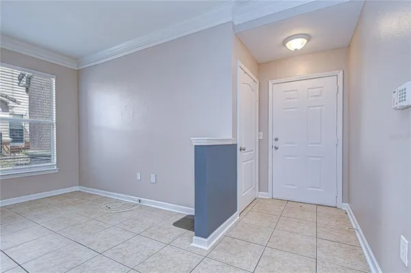 a spacious bathroom with a granite countertop sink a mirror and a shower
