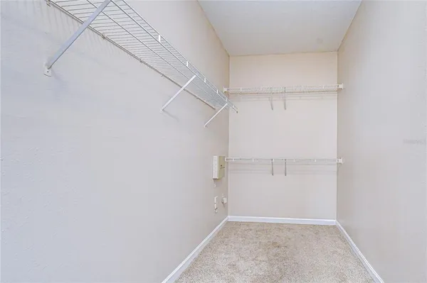 a bathroom with a sink toilet a mirror and shower