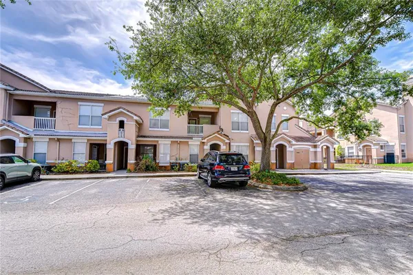 a bathroom with a sink a toilet and a shower