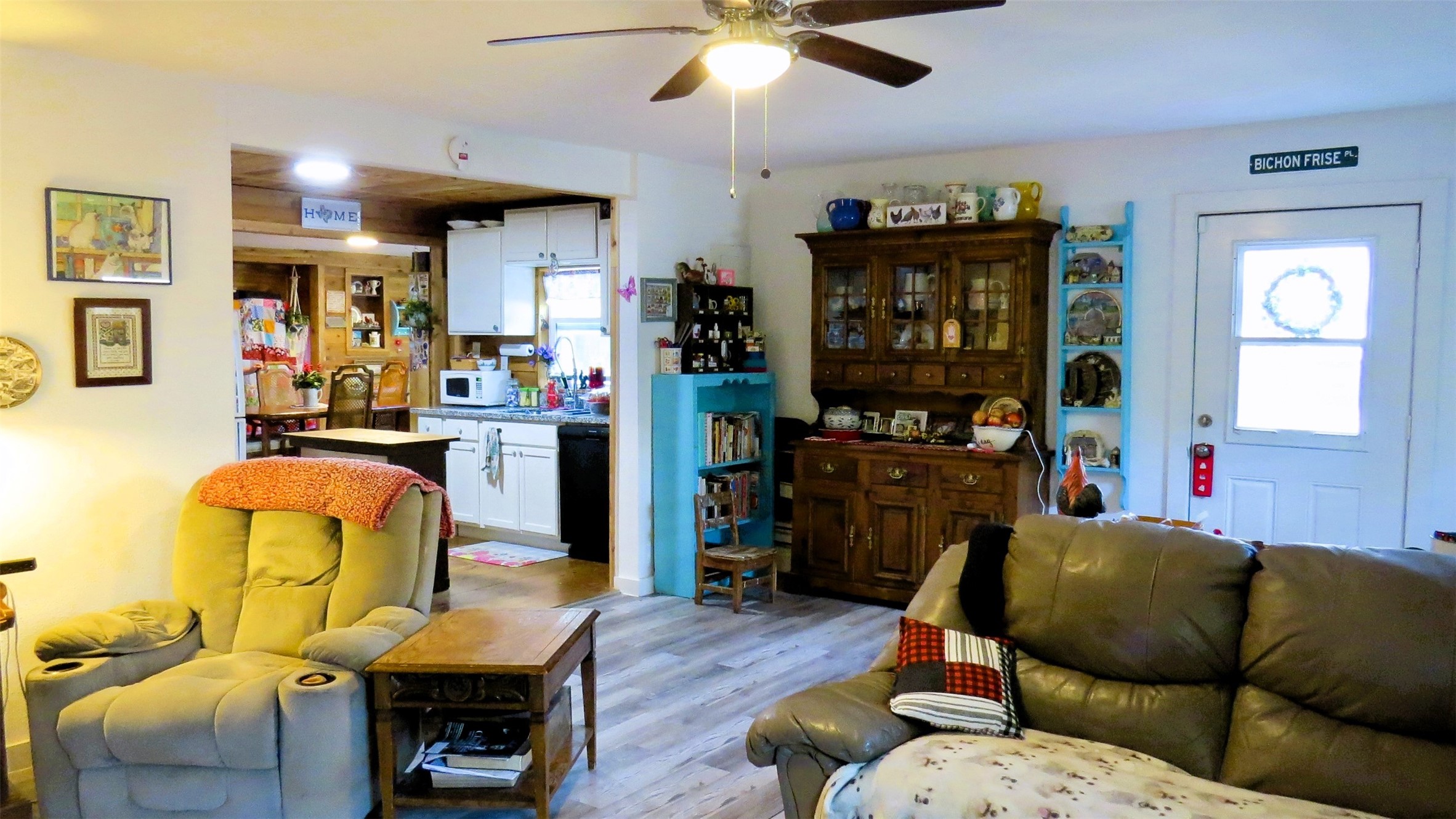 458 Rain Forest Road Onalaska, TX 77360 - Photo 12 of 35 a living room with furniture and wooden floor