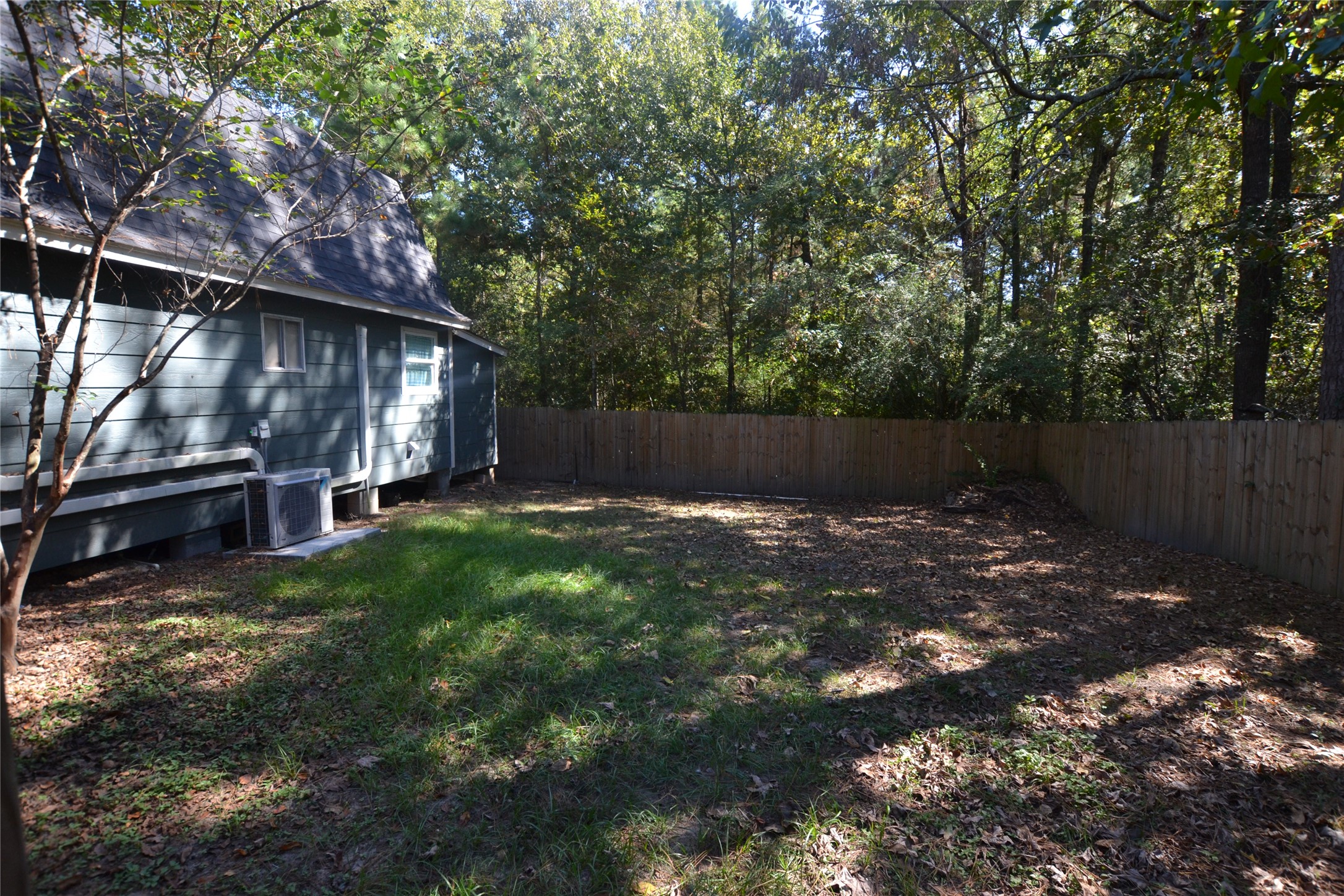 458 Rain Forest Road Onalaska, TX 77360 - Photo 18 of 25 a view of backyard with green space