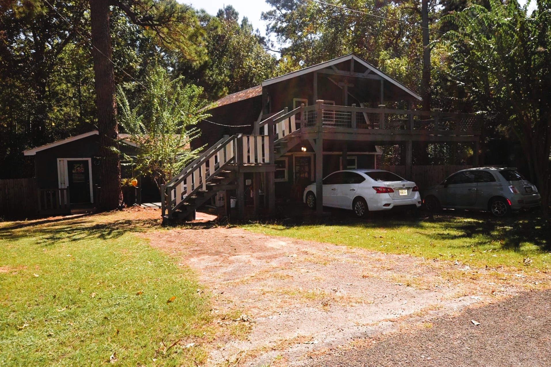 458 Rain Forest Road Onalaska, TX 77360 - Photo 32 of 35 a front view of a house with a yard