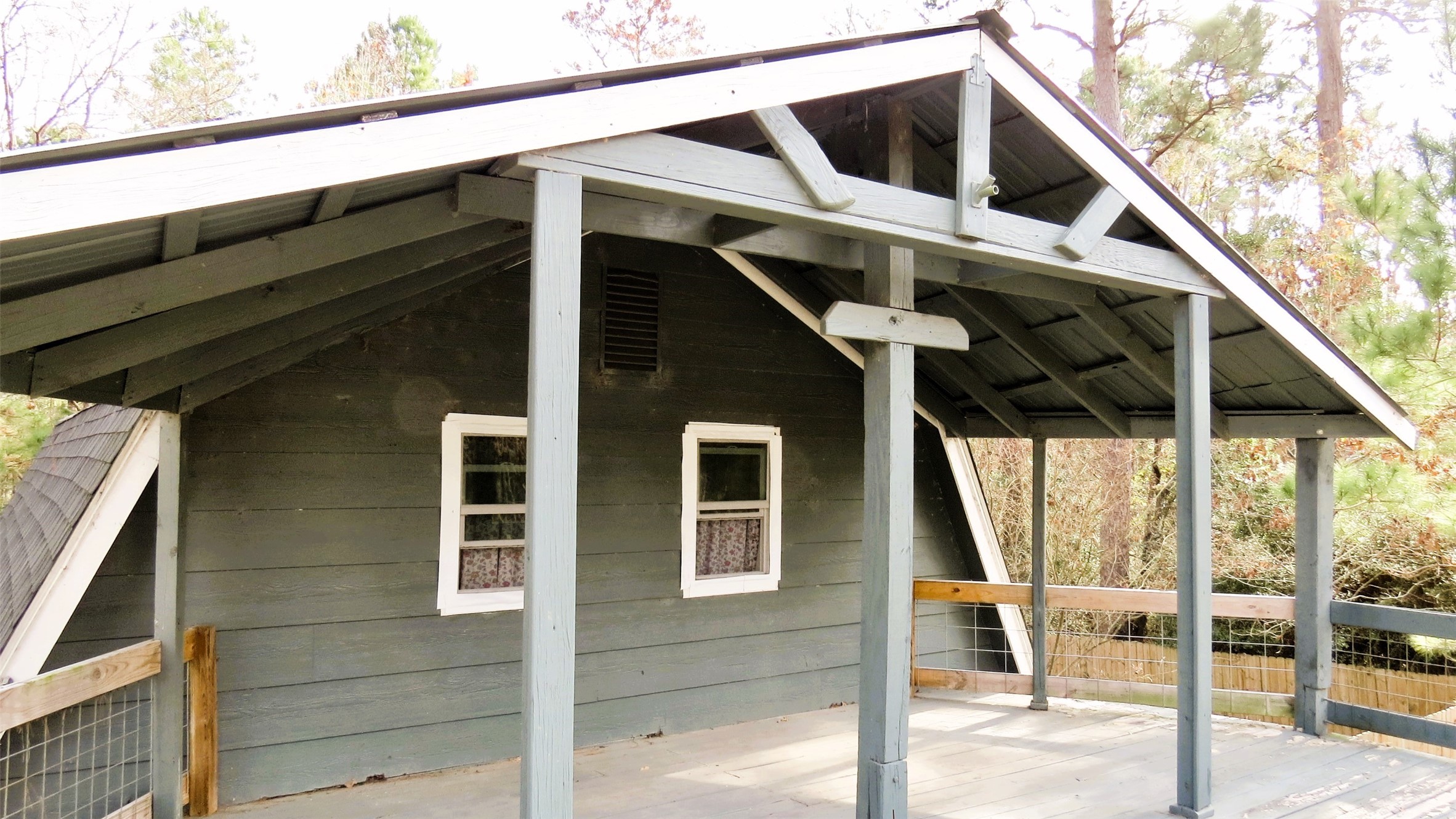 458 Rain Forest Road Onalaska, TX 77360 - Photo 5 of 35 a front view of a house with a yard