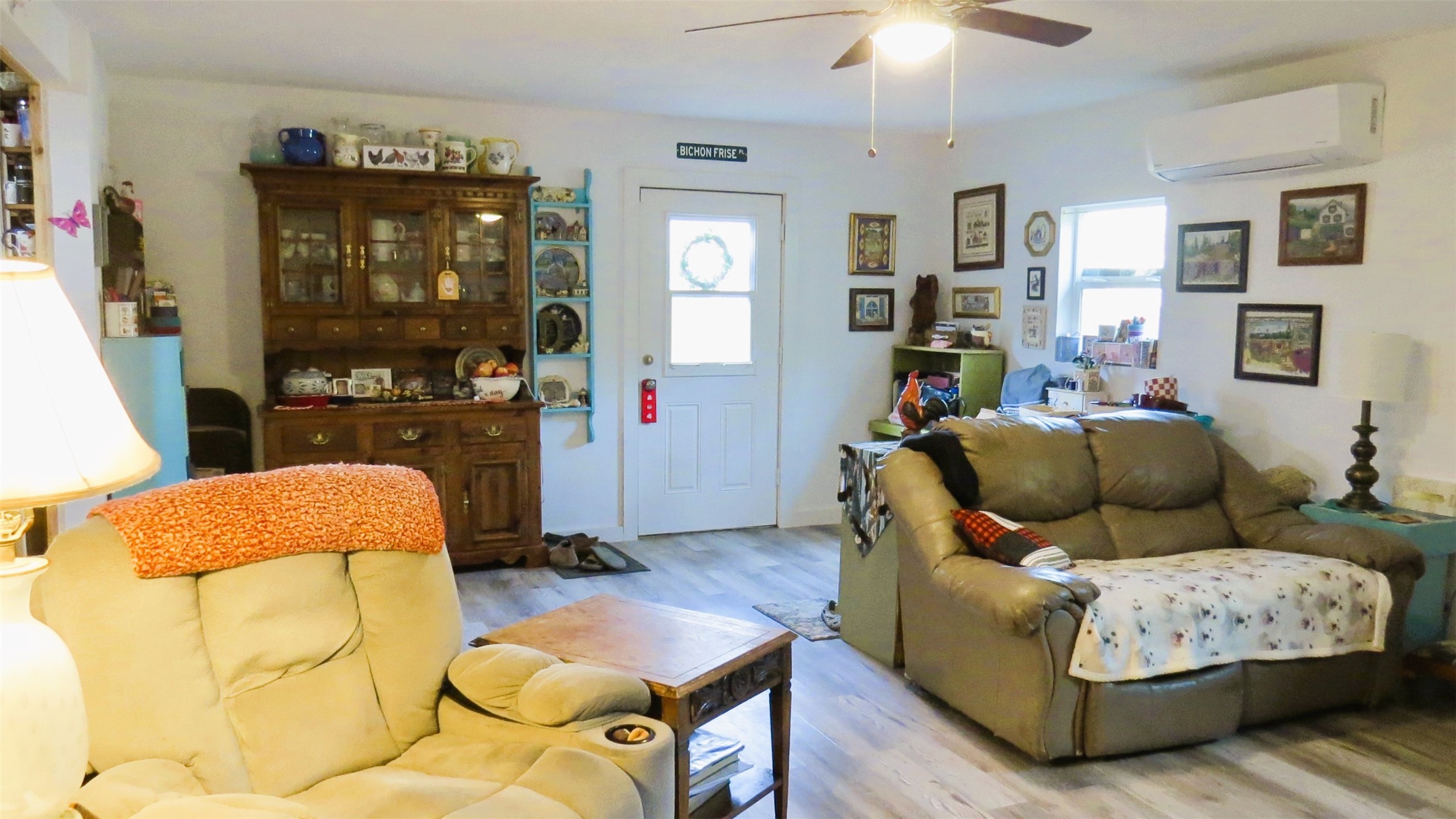 458 Rain Forest Road Onalaska, TX 77360 - Photo 7 of 35 a living room with furniture and wooden floor