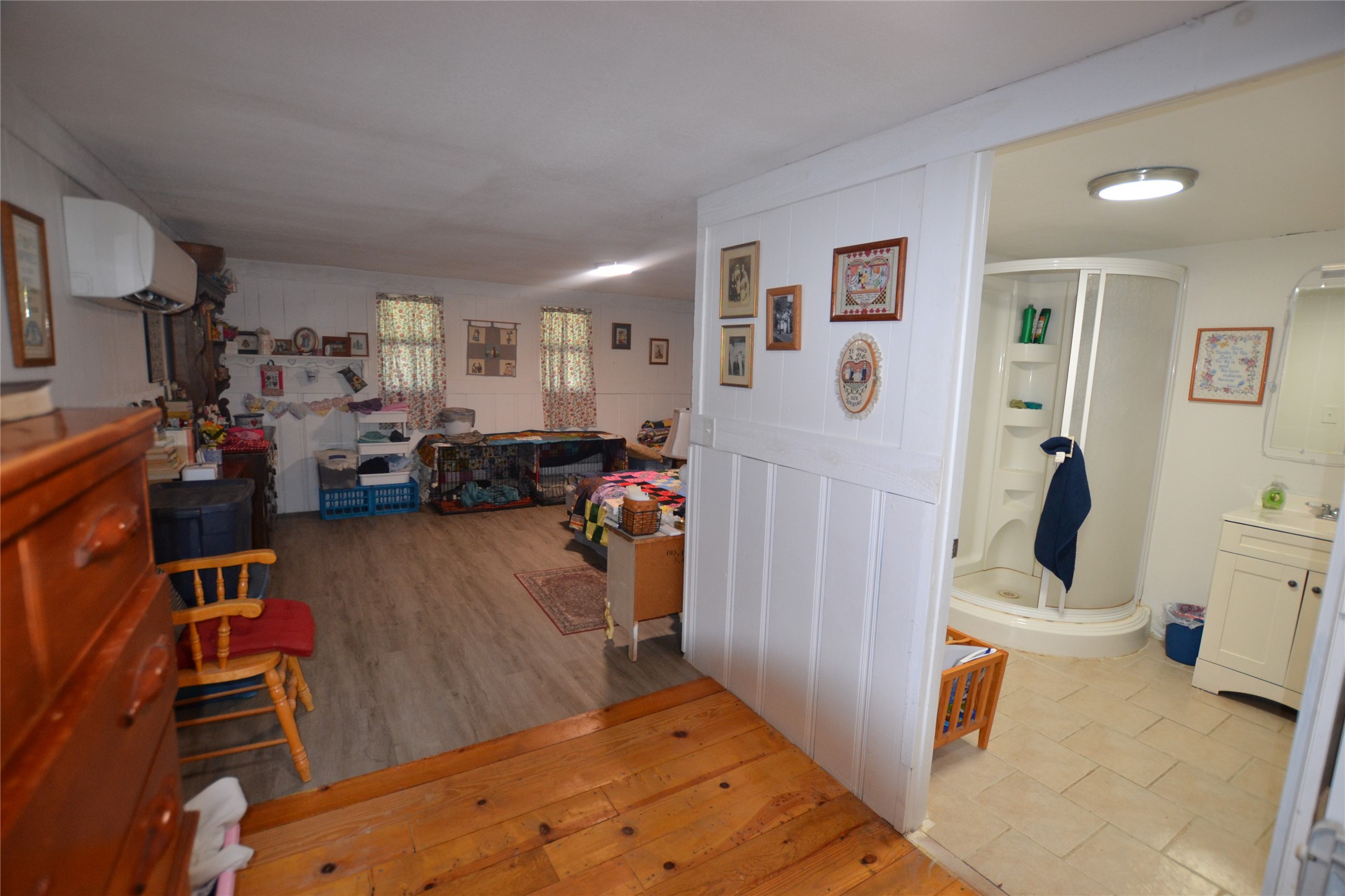 458 Rain Forest Road Onalaska, TX 77360 - Photo 8 of 25 a view of a livingroom with furniture and storage