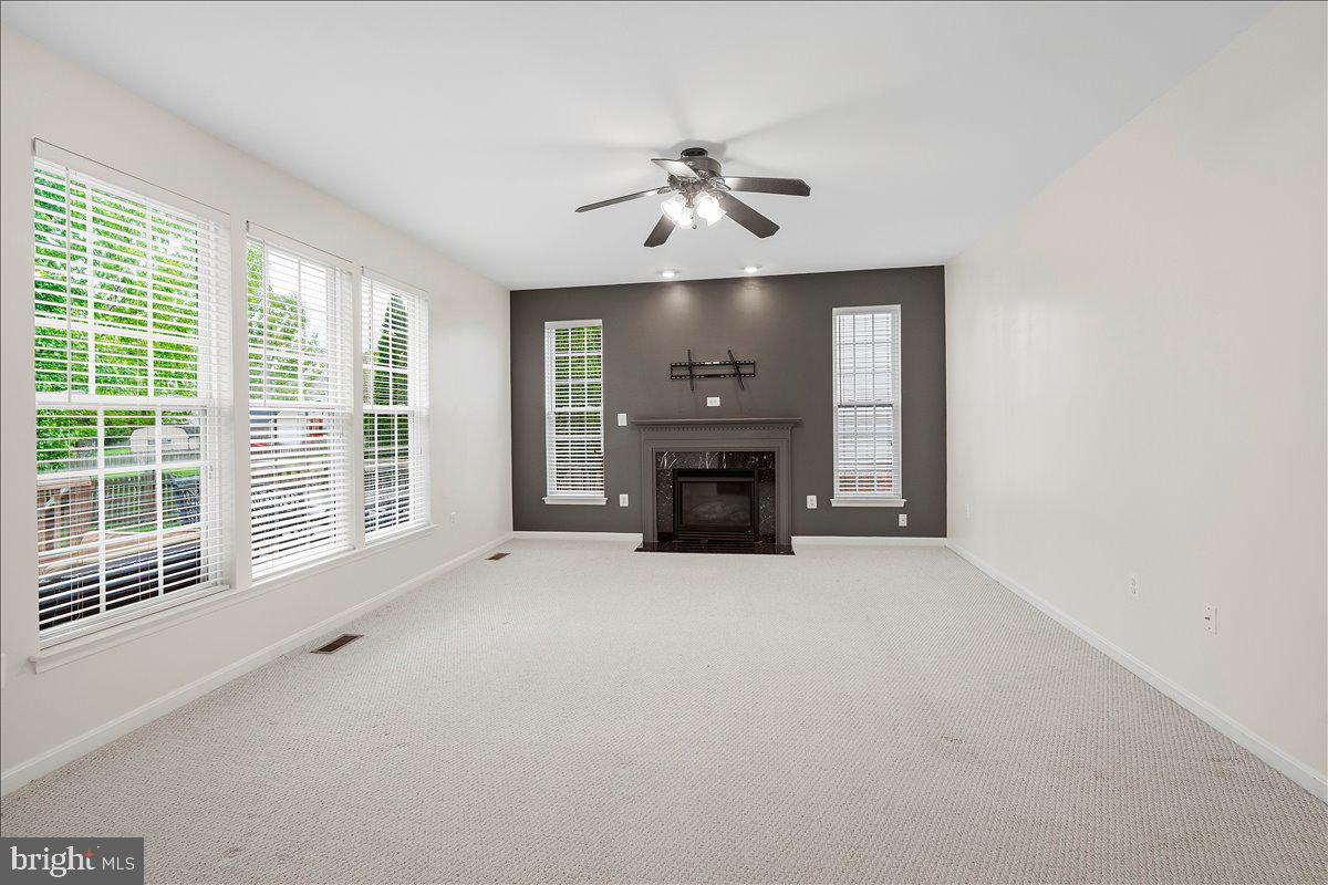 5902 Union Ridge Drive Adamstown, MD 21710 - Photo 12 of 46 Family room with gas fireplace