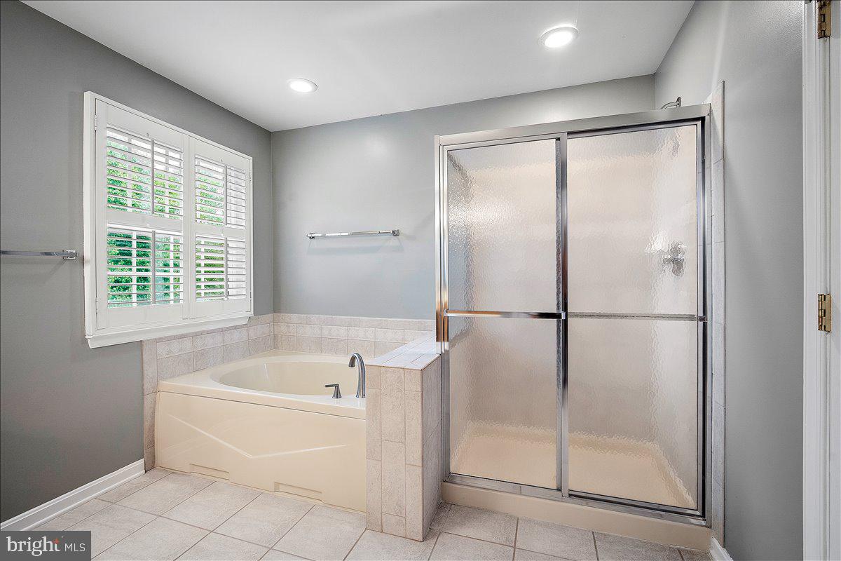 5902 Union Ridge Drive Adamstown, MD 21710 - Photo 28 of 46 Walk in shower and soaking tub