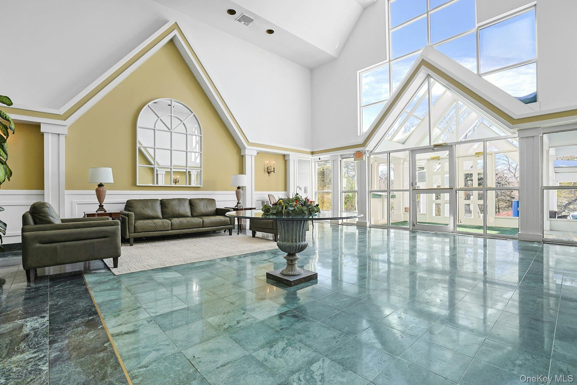 333 North State Road, Unit 22 Briarcliff Manor, NY 10510 - Photo 3 of 23 Welcoming atrium where guests are greeted