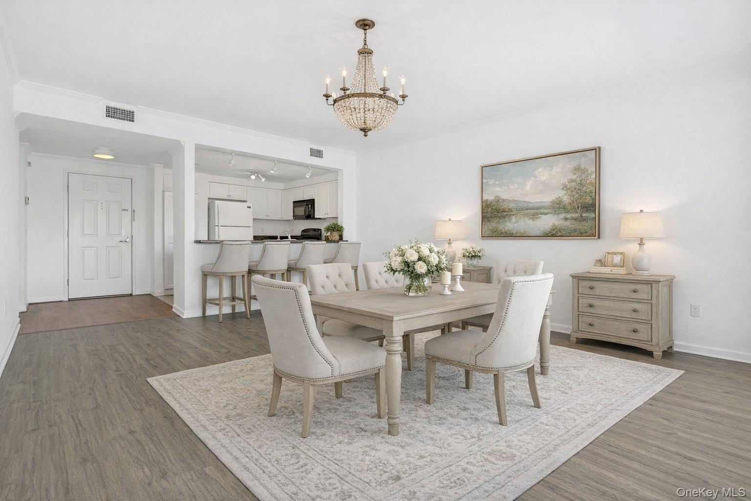 333 North State Road, Unit 22 Briarcliff Manor, NY 10510 - Photo 5 of 23 VIRTUALLY STAGED dining area / breakfast bar