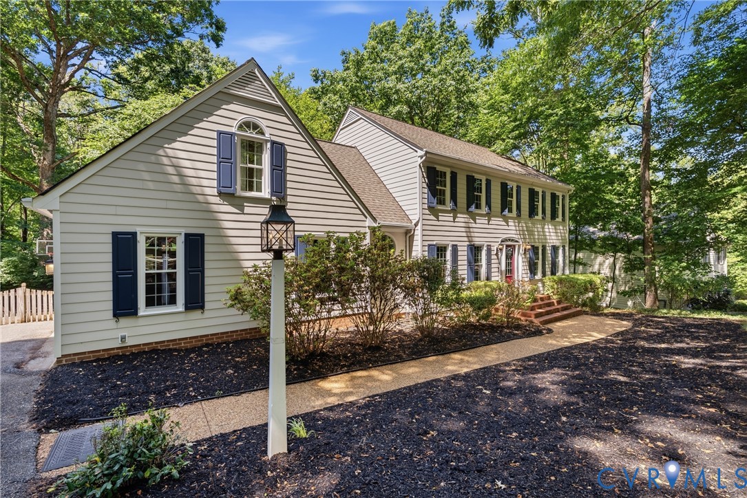 14321 Crossings Ridge Drive Midlothian, VA 23113 - Photo 2 of 43 a view of a house with a yard
