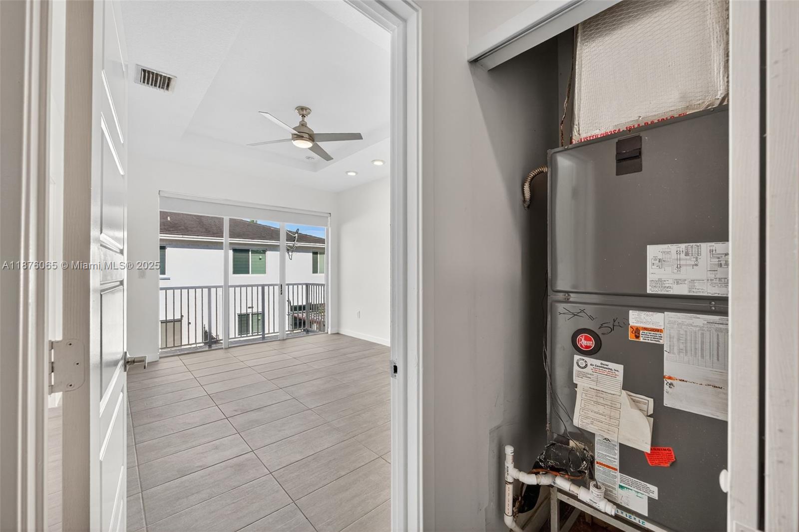 17606 Southwest 149th Place, Unit 17606 Miami, FL 33187 - Photo 52 of 69 A/C Closet, 2nd Level