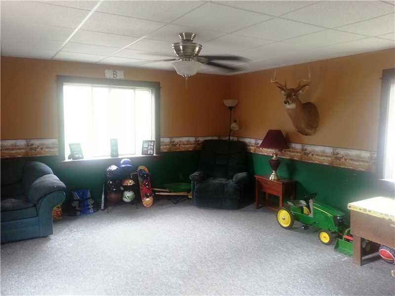 61 West Main Street Milo, ME 04463 - Photo 3 of 11 Den/Family/Great Room.