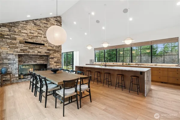 a kitchen with a table and chairs in it