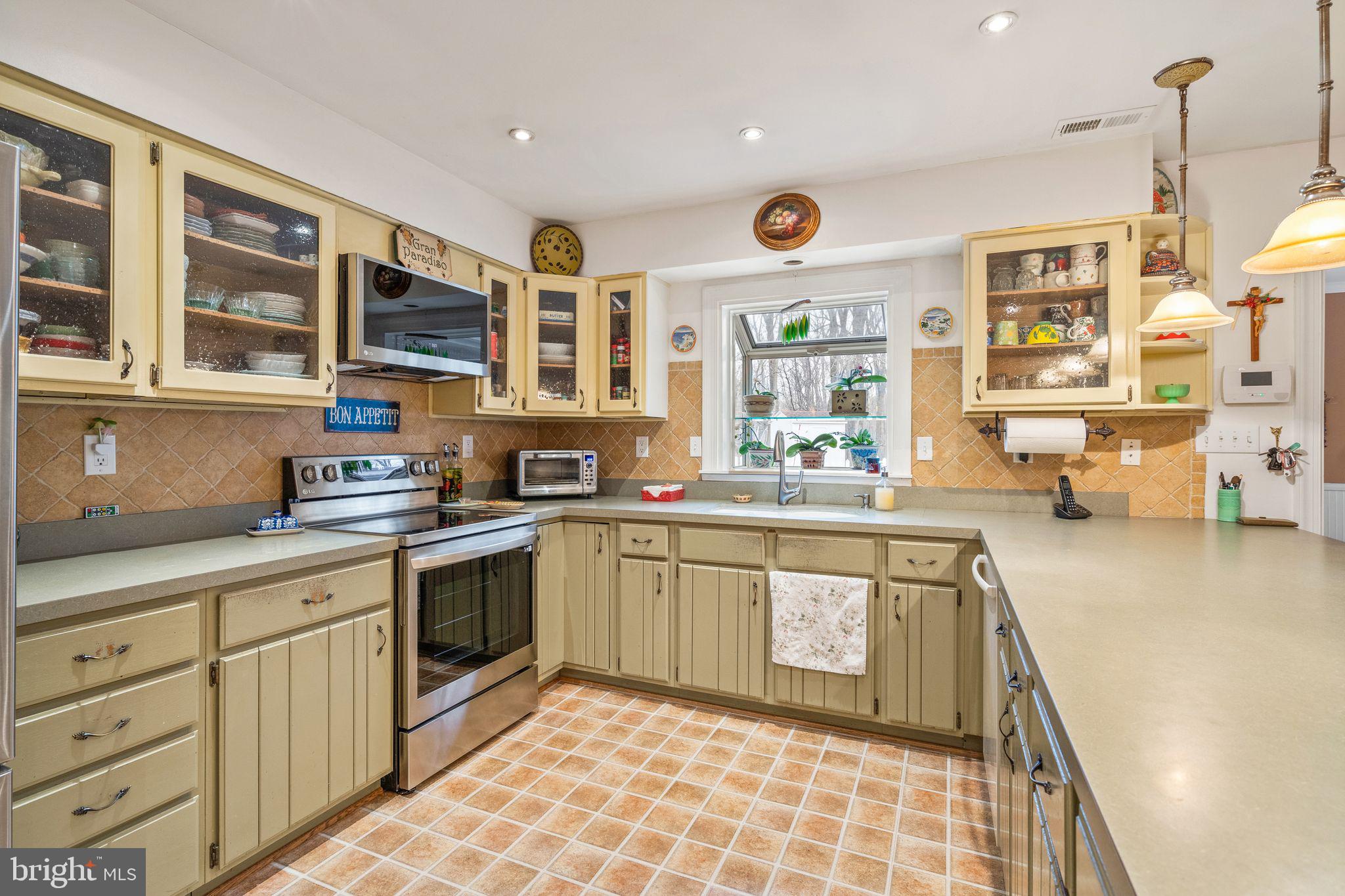 3768 Cobbler Mountain Road Delaplane, VA 20144 - Photo 11 of 47 Greenhouse window over sink overlooking patio