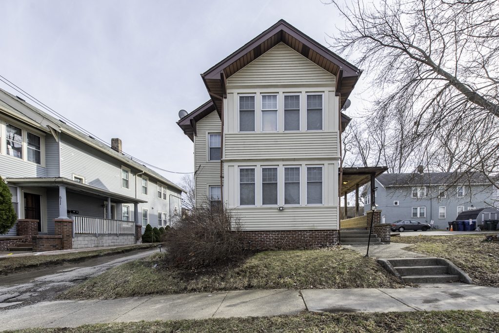 515 2nd Street, Unit 2 Waukegan, IL 60085 - Photo 2 of 27 front view of a house with a street