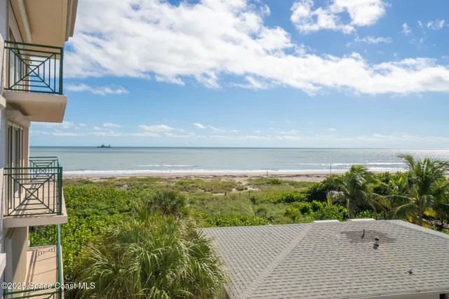 a view of building with yard