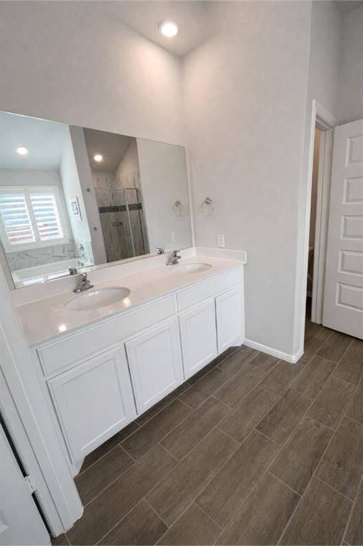 6609 Adderly Road Pilot Point, TX 76258 - Photo 7 of 15 a bathroom with a sink and a mirror