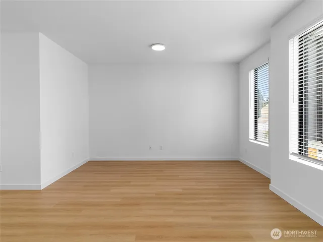 a view of kitchen with wooden floor