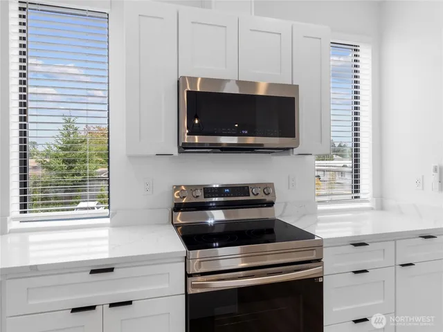 a bathroom with a sink a vanity and mirror
