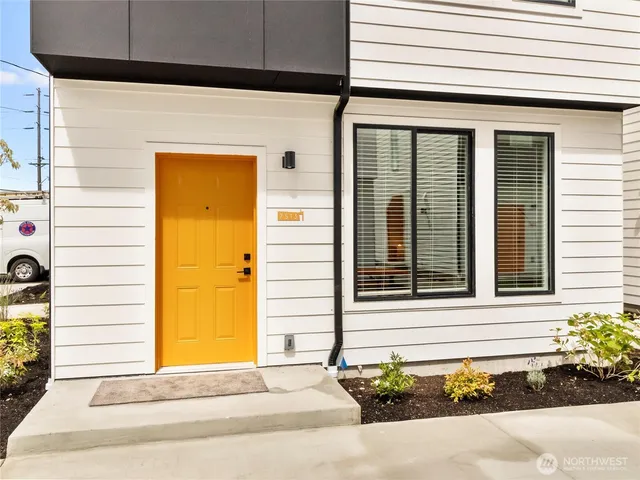 a front view of a house with a garage