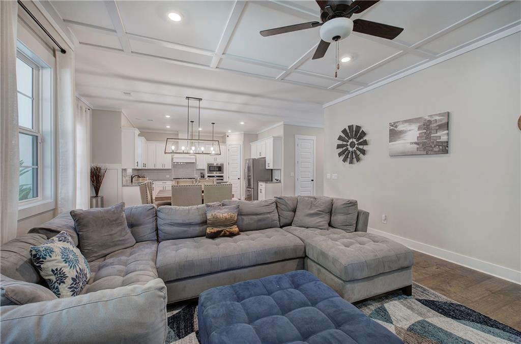 503 London Road Ball Ground, GA 30107 - Photo 9 of 55 a living room with furniture and a chandelier