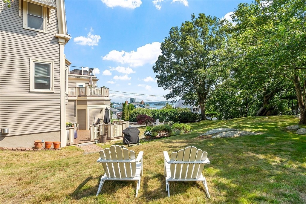 5 Babson Street, Unit 2 Gloucester, MA 01930 - Photo 27 of 30 a view of an house with backyard space and balcony