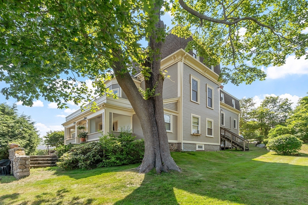 5 Babson Street, Unit 2 Gloucester, MA 01930 - Photo 29 of 30 a front view of a house with garden