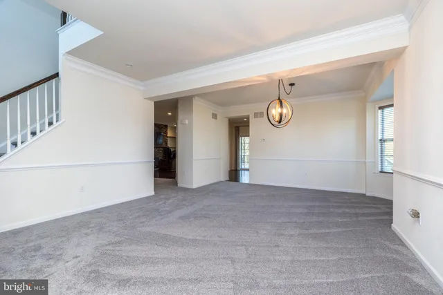 a bathroom with a sink and mirror with toilet