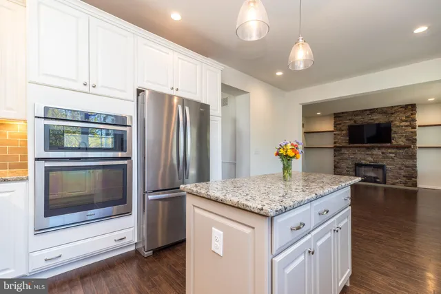 a view of a hallway with a window