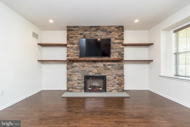 a bathroom with a sink double vanity and a mirror