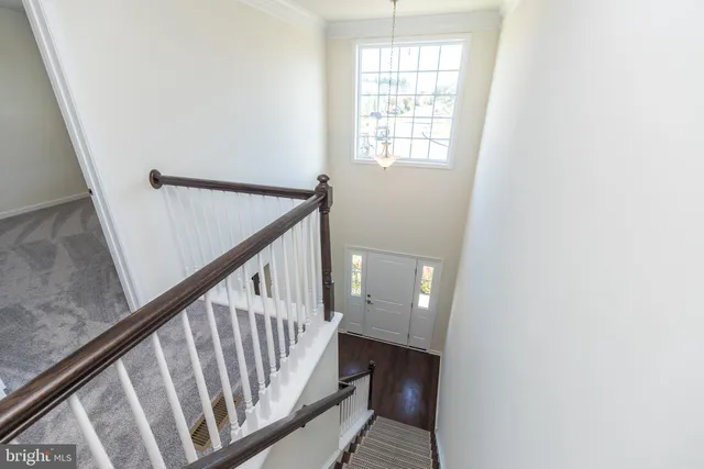 a view of hallway with stairs