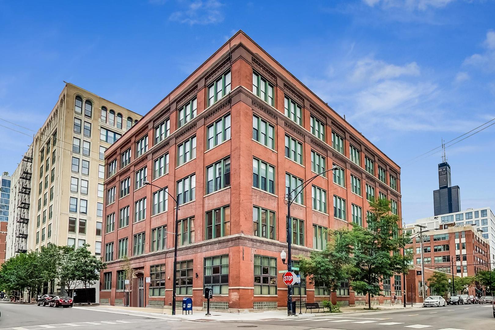 331 South Peoria Street, Unit 502 Chicago, IL 60607 - Photo 1 of 32 a front view of a building