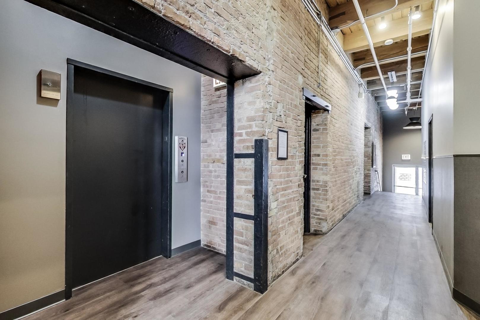 331 South Peoria Street, Unit 502 Chicago, IL 60607 - Photo 2 of 32 a view of a porch with wooden floor and stairs