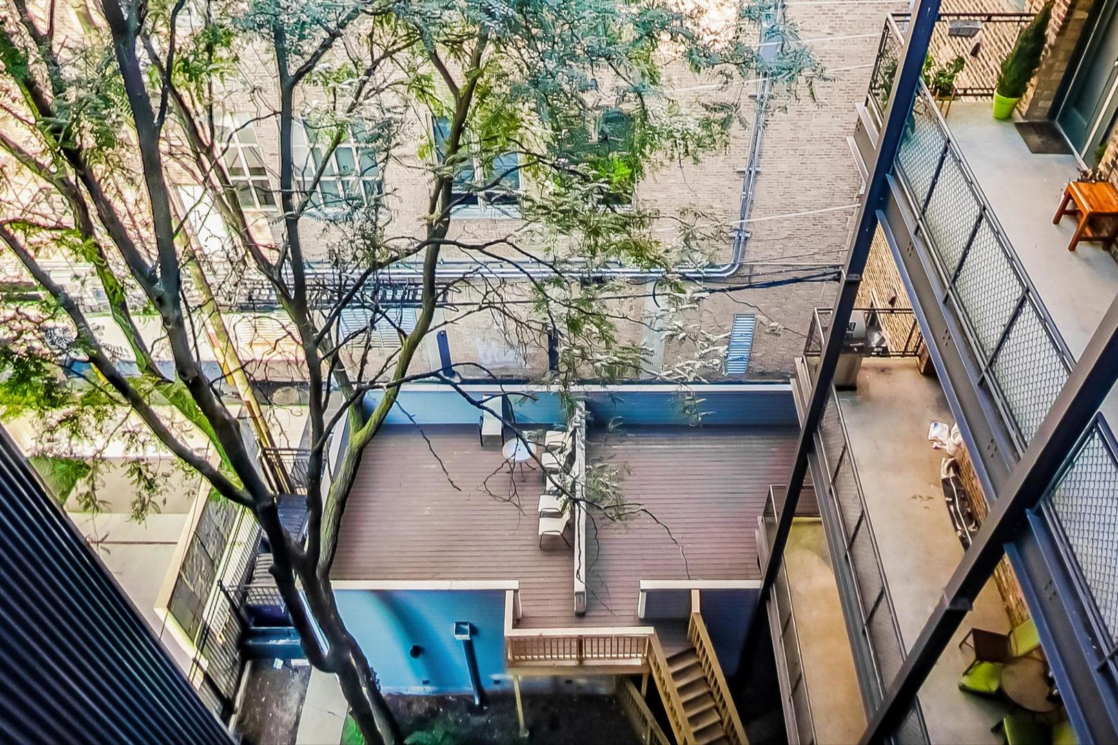 331 South Peoria Street, Unit 502 Chicago, IL 60607 - Photo 28 of 32 a view of balcony with chairs