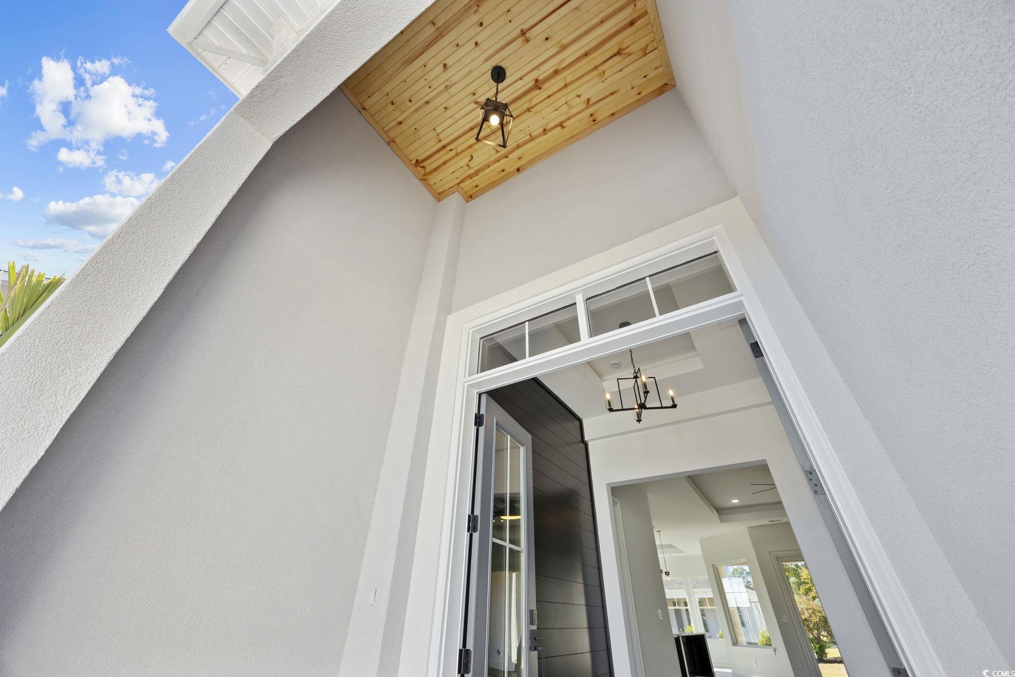 125 Lac Courte Myrtle Beach, SC 29579 - Photo 4 of 40 Entrance to property with stucco siding