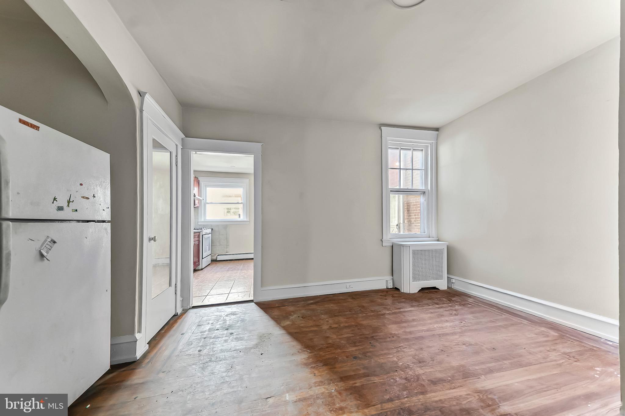 7269 Walnut Street Upper Darby, PA 19082 - Photo 15 of 17 an empty room with windows and closet