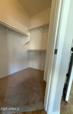 a large bathroom with a double vanity sink and a mirror