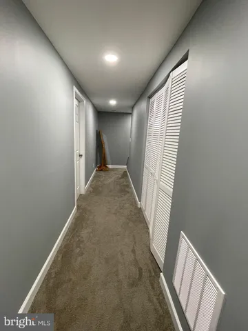 a view of hallway with stairs