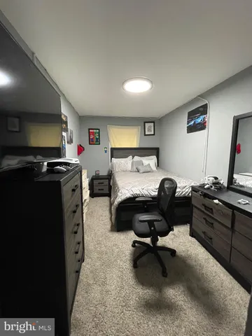 a view of a workspace with furniture