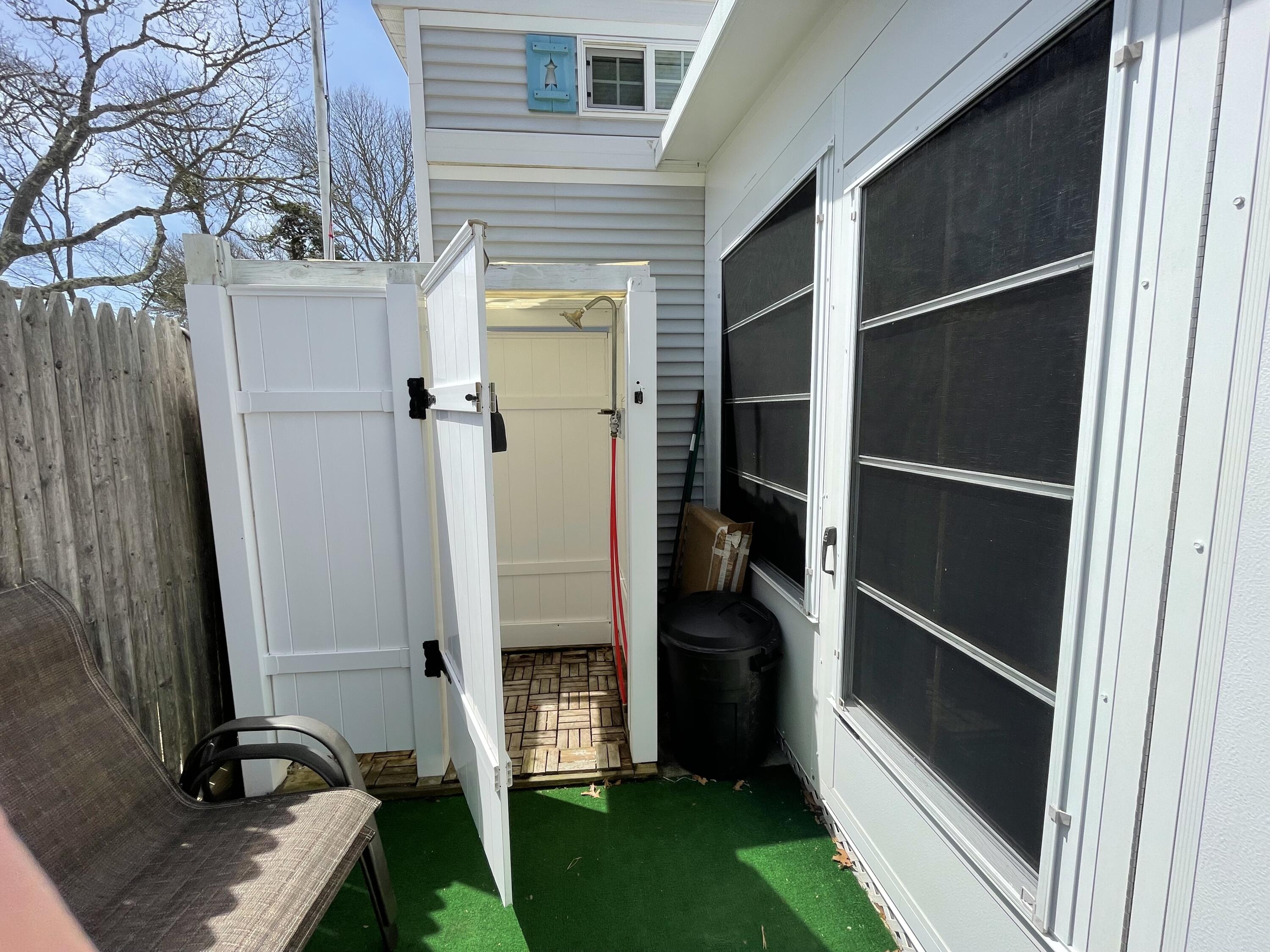184 Old Wharf Road, Unit G05 Dennis Port, MA 02639 - Photo 15 of 17 a view of front door and yard