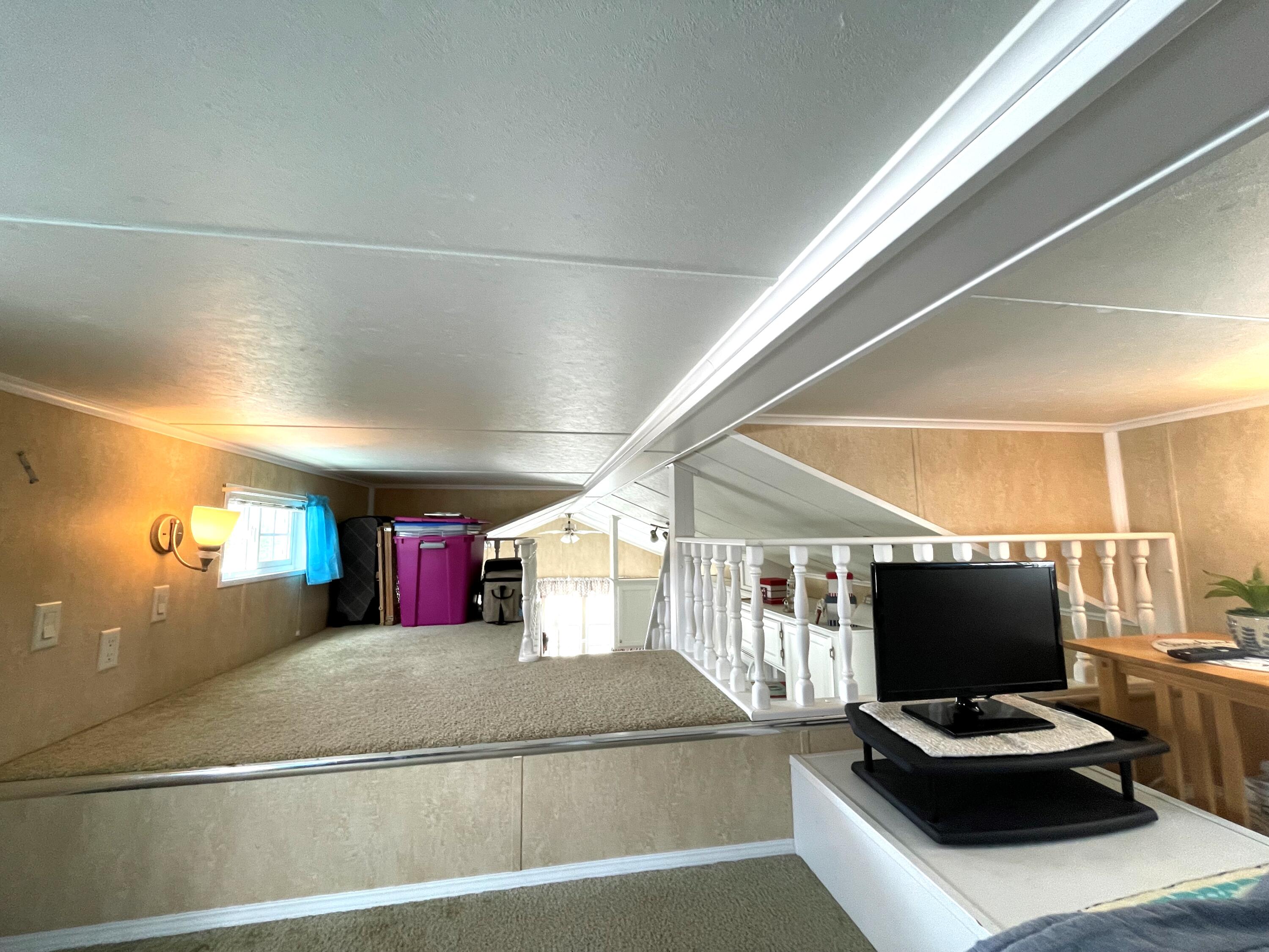 184 Old Wharf Road, Unit G05 Dennis Port, MA 02639 - Photo 9 of 17 a view of a living room and workspace