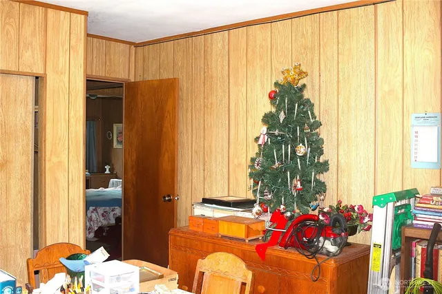 a bed room with a bed and a window