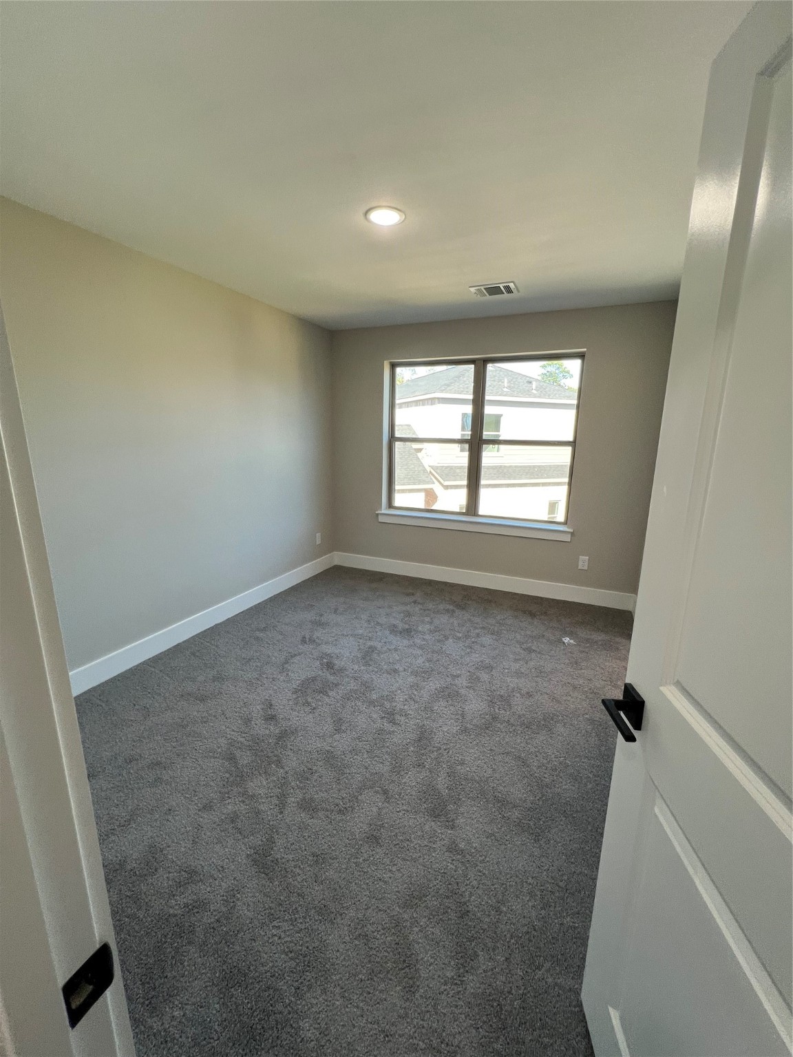 2511 Martinas Ct Spring Spring, TX 77388 - Photo 15 of 30 an empty room with a empty space and windows