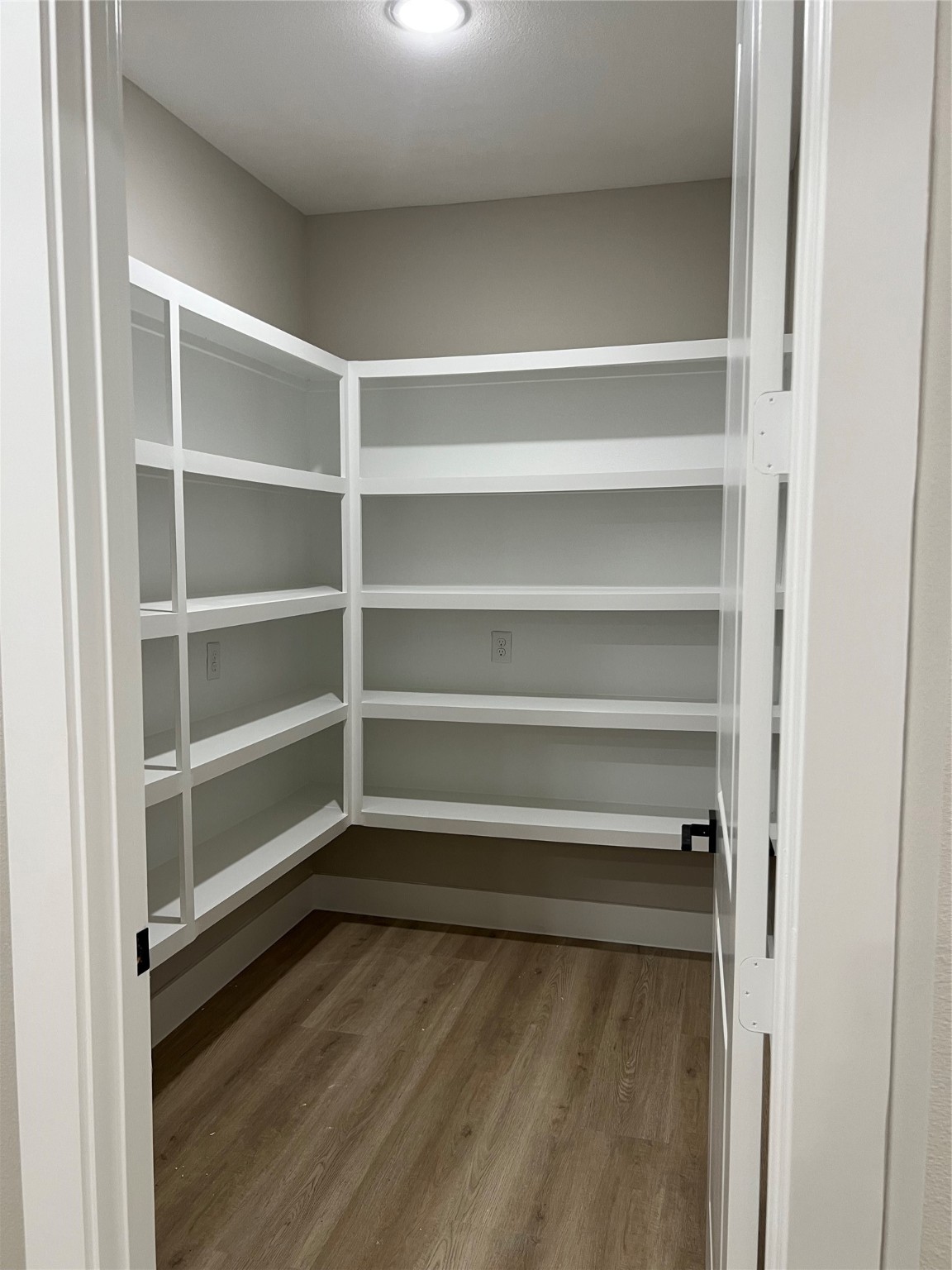 2511 Martinas Ct Spring Spring, TX 77388 - Photo 27 of 30 a view of walk in closet with empty racks