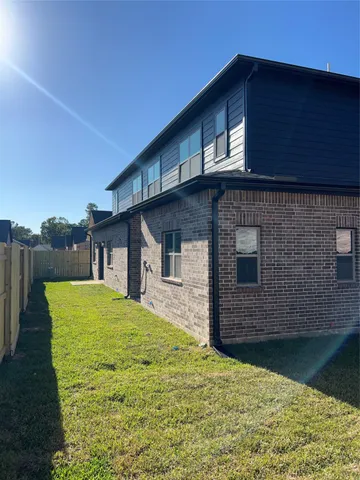 a house view with a garden space