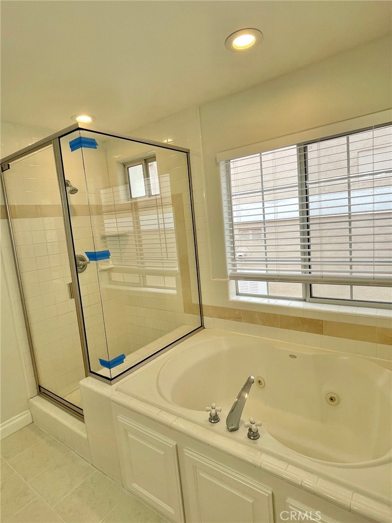 1745 Havemeyer Lane Redondo Beach, CA 90278 - Photo 13 of 20 a bathroom with a bathtub and a shower
