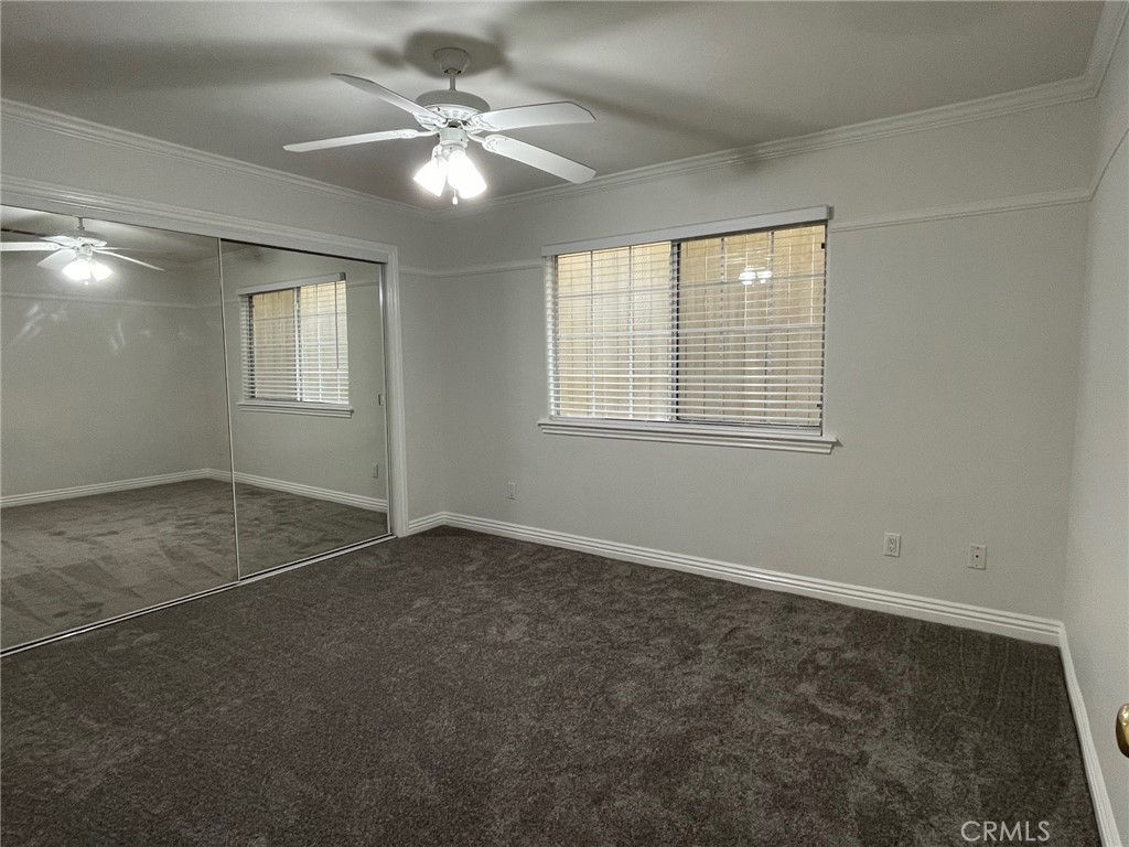 1745 Havemeyer Lane Redondo Beach, CA 90278 - Photo 17 of 20 en empty room with windows and ceiling fan